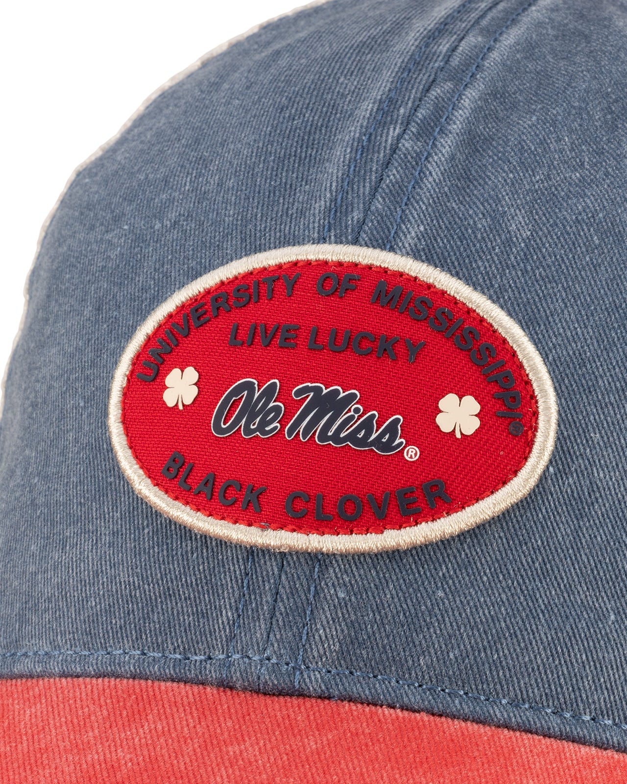 Blue and red two tone vintage style hat from Black Clover featuring Ole Miss logo