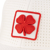 White perforated hat from Black Clover featuring Rutgers Scarlet Knights Logo