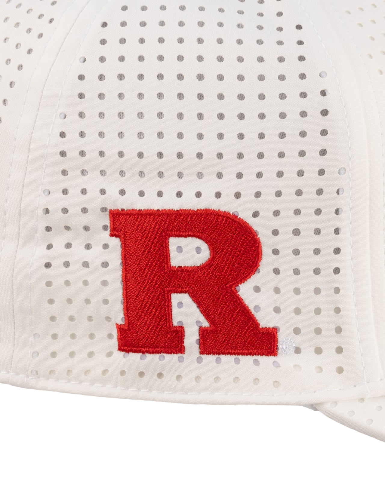 White perforated hat from Black Clover featuring Rutgers Scarlet Knights Logo