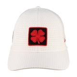 White perforated hat from Black Clover featuring South Dakota Coyotes logo