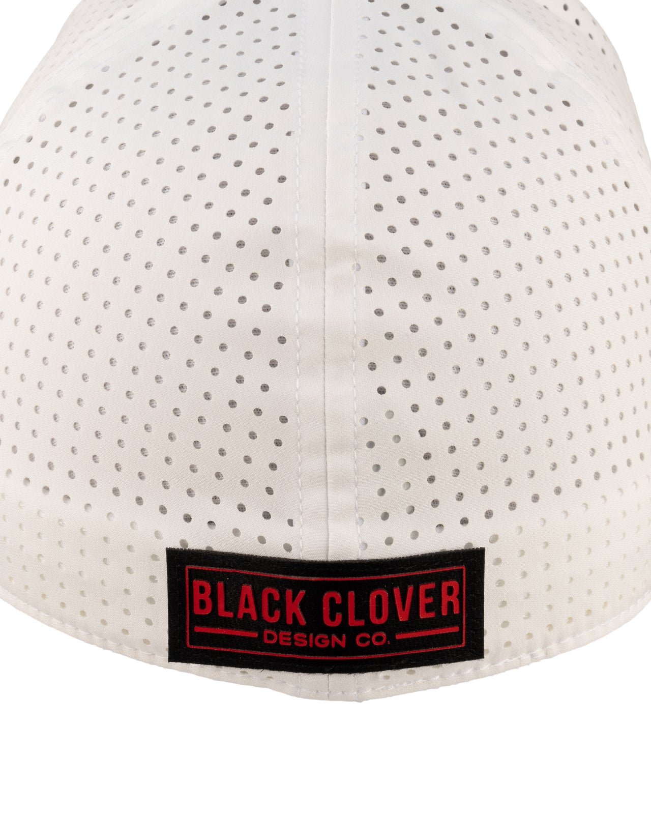 White perforated hat from Black Clover featuring South Dakota Coyotes logo