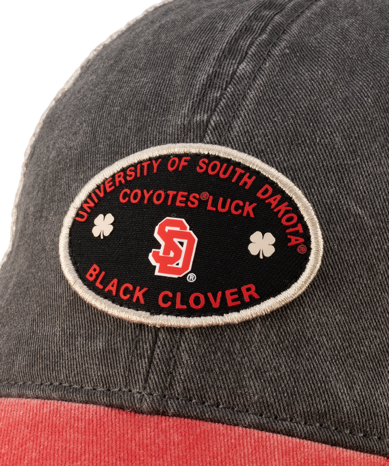 Red and black two tone vintage style hat from Black Clover featuring South Dakota Coyotes logo