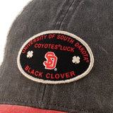 Red and black two tone vintage style hat from Black Clover featuring South Dakota Coyotes logo