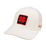 White perforated hat from Black Clover featuring Texas Tech Red Raiders logo