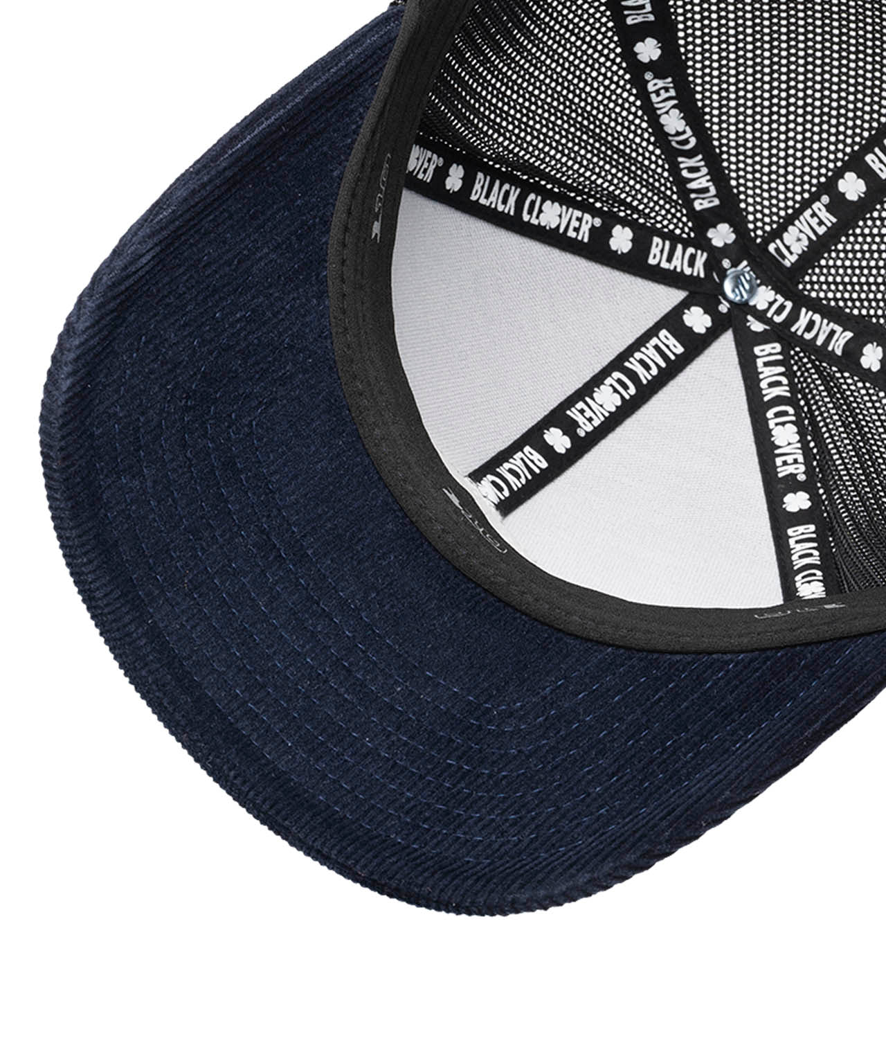 blue corduroy hat with a patch depicting a mountain ridgeline