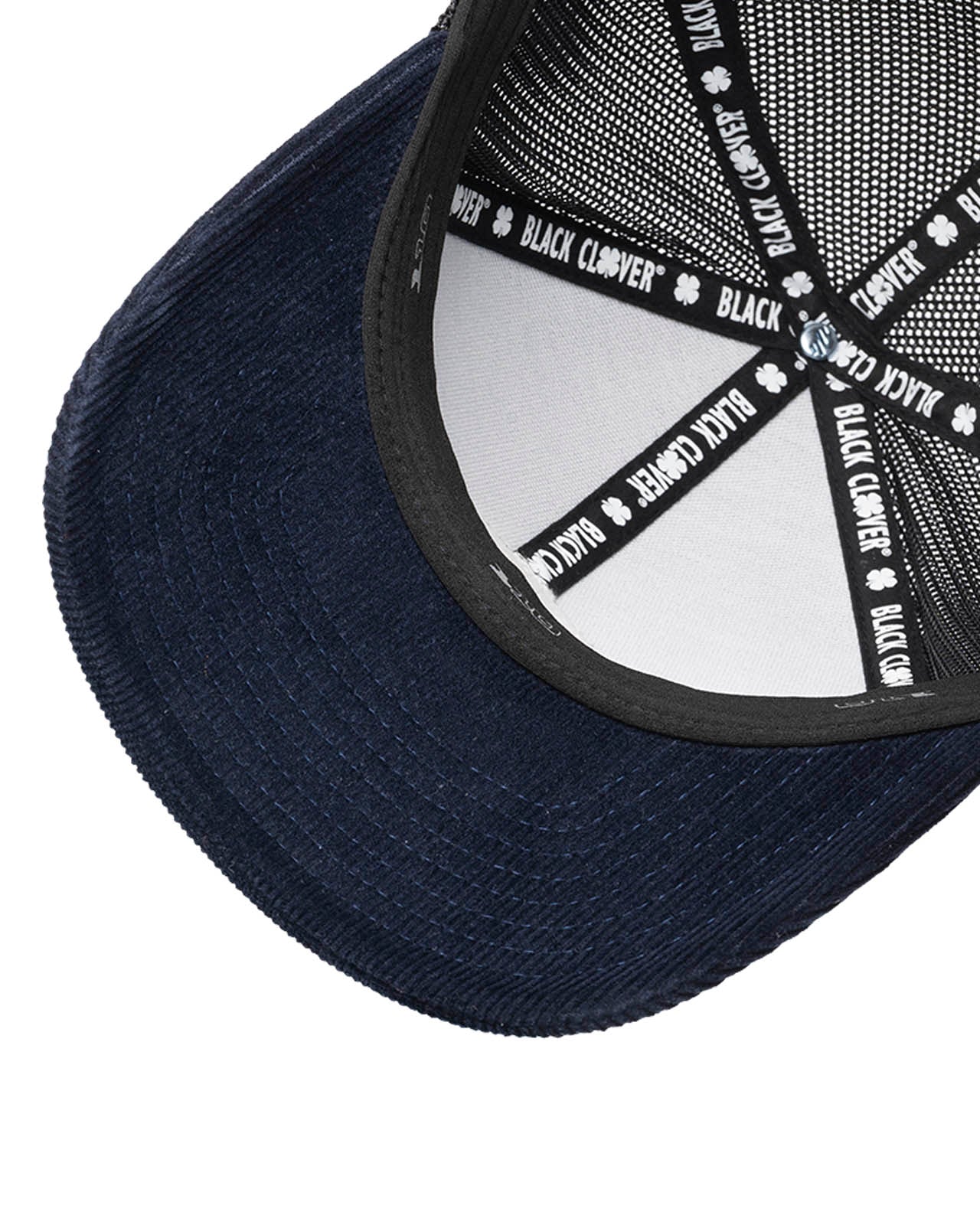 blue corduroy hat with a patch depicting a mountain ridgeline