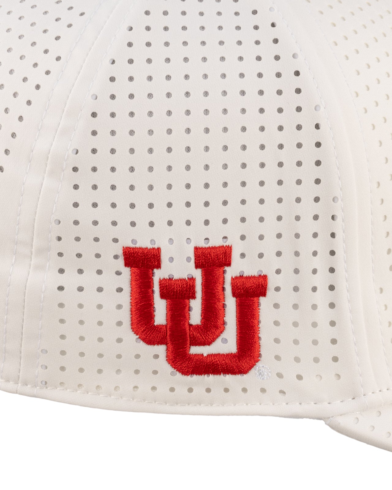 White perforated hat from Black Clover featuring University of Utah logo