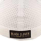 White perforated hat from Black Clover featuring Vanderbilt Commodores logo