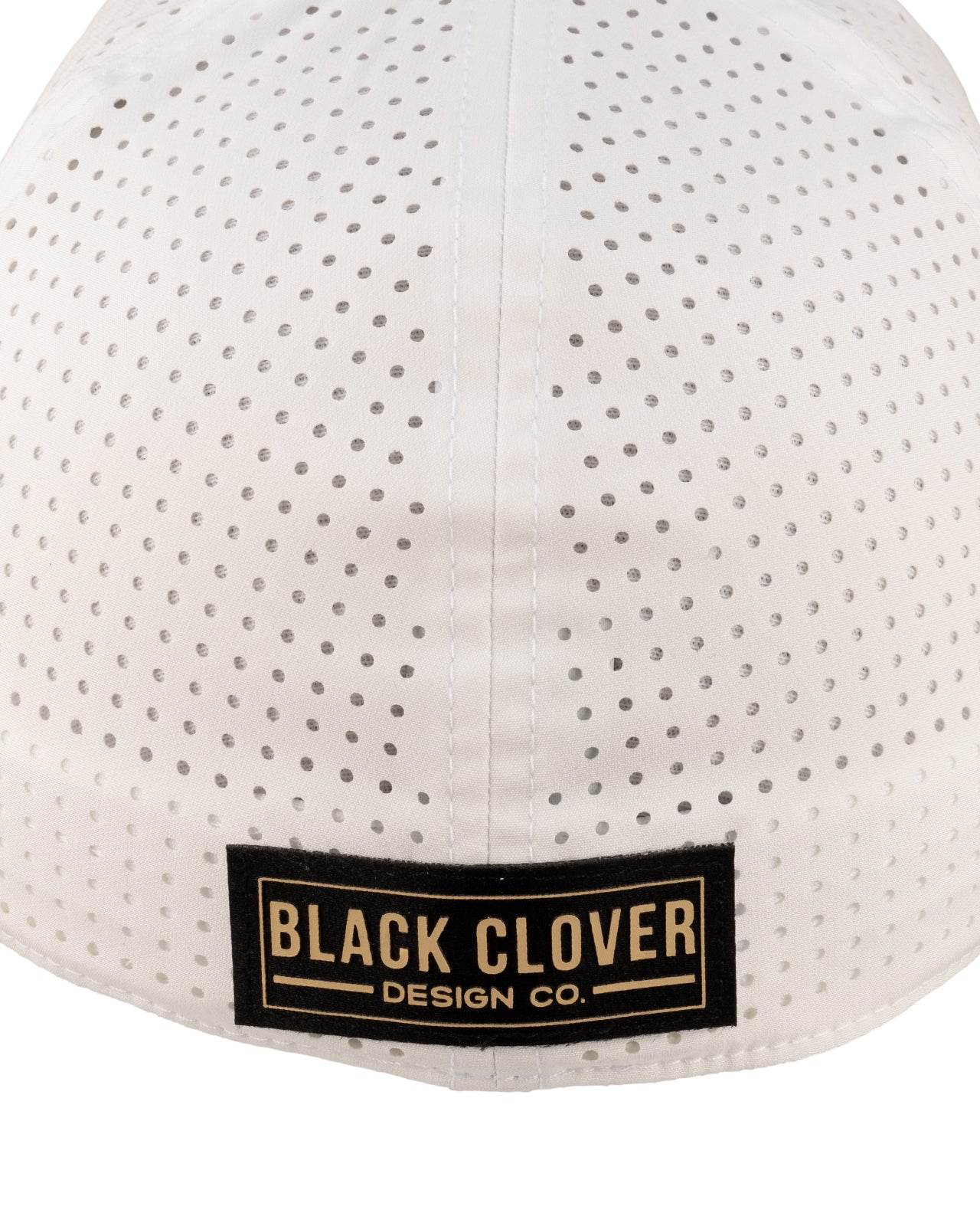 White perforated hat from Black Clover featuring Vanderbilt Commodores logo