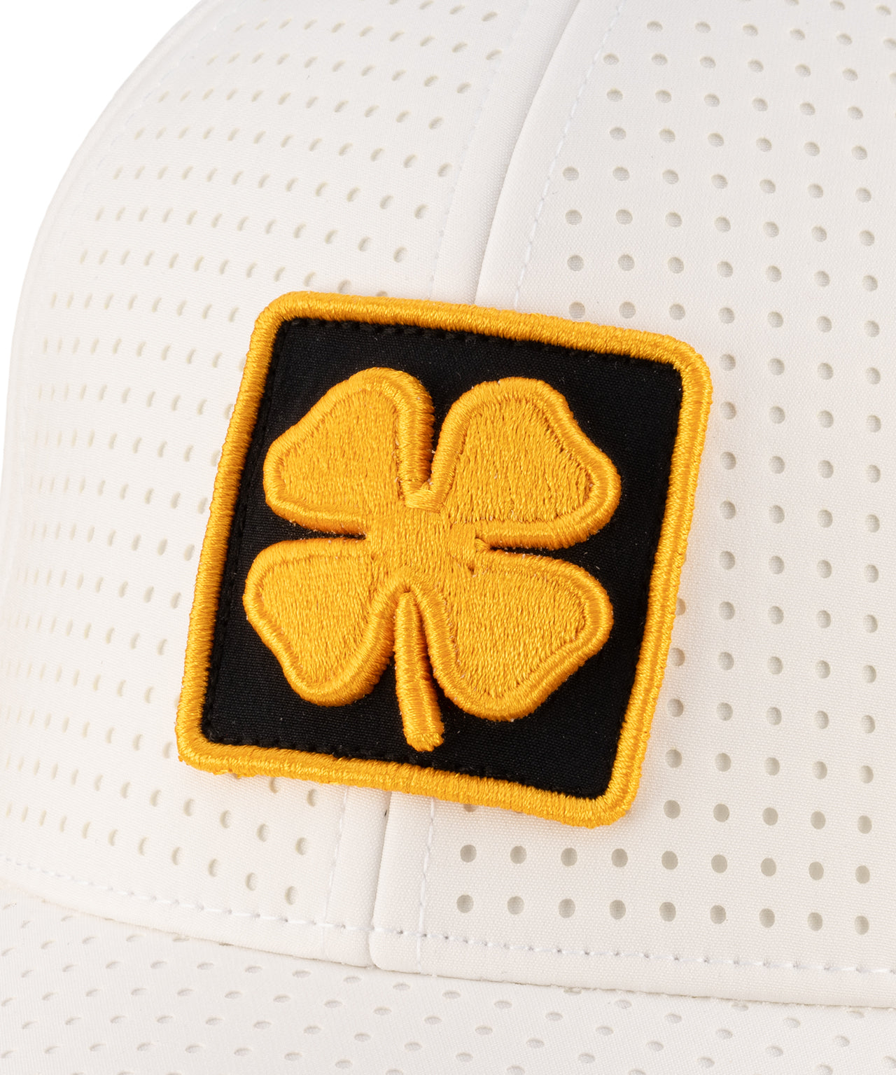 White perforated hat from Black Clover featuring Wichita State Shockers logo