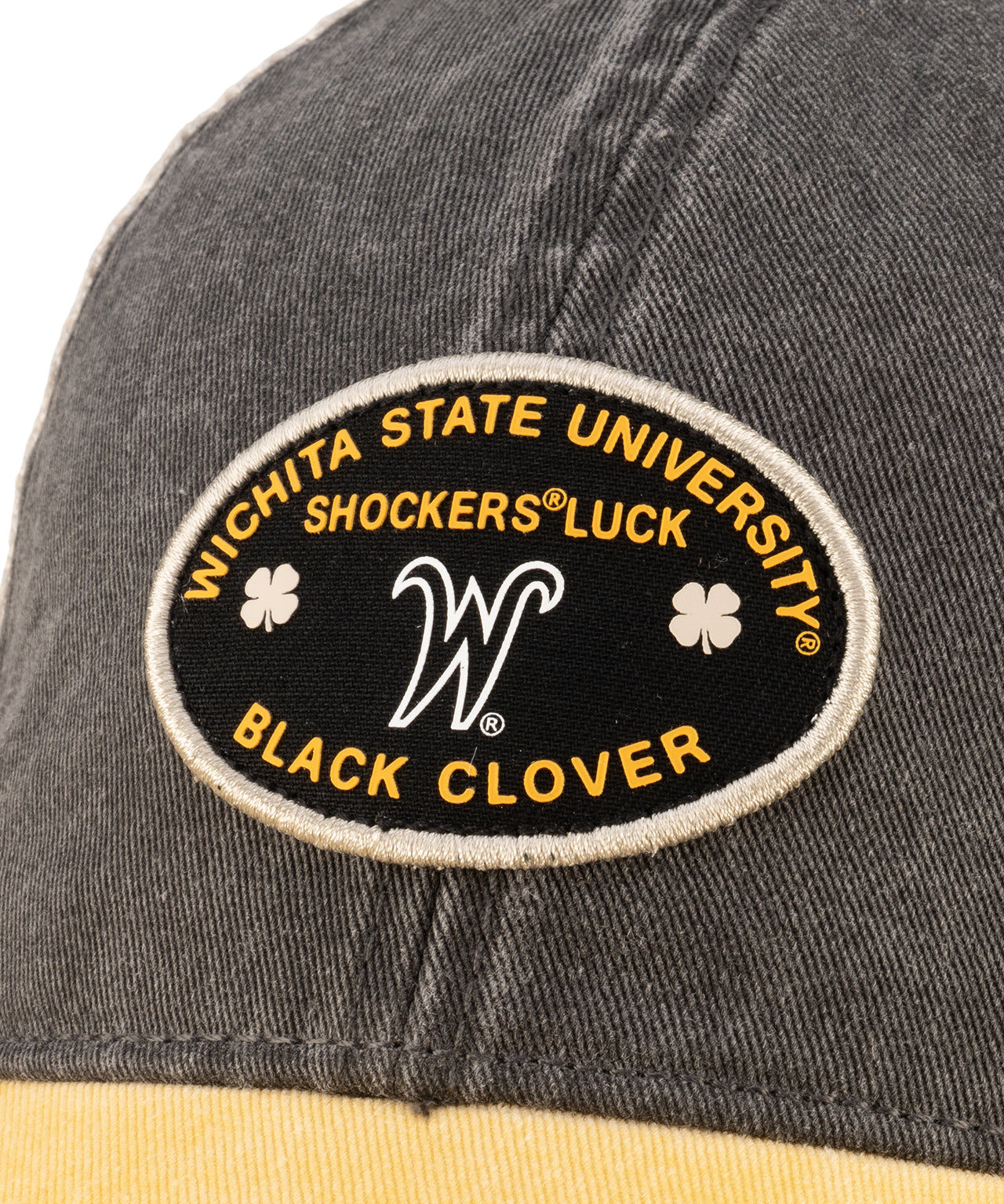 Grey and yellow two tone vintage style hat from Black Clover featuring Wichita State Shockers logo