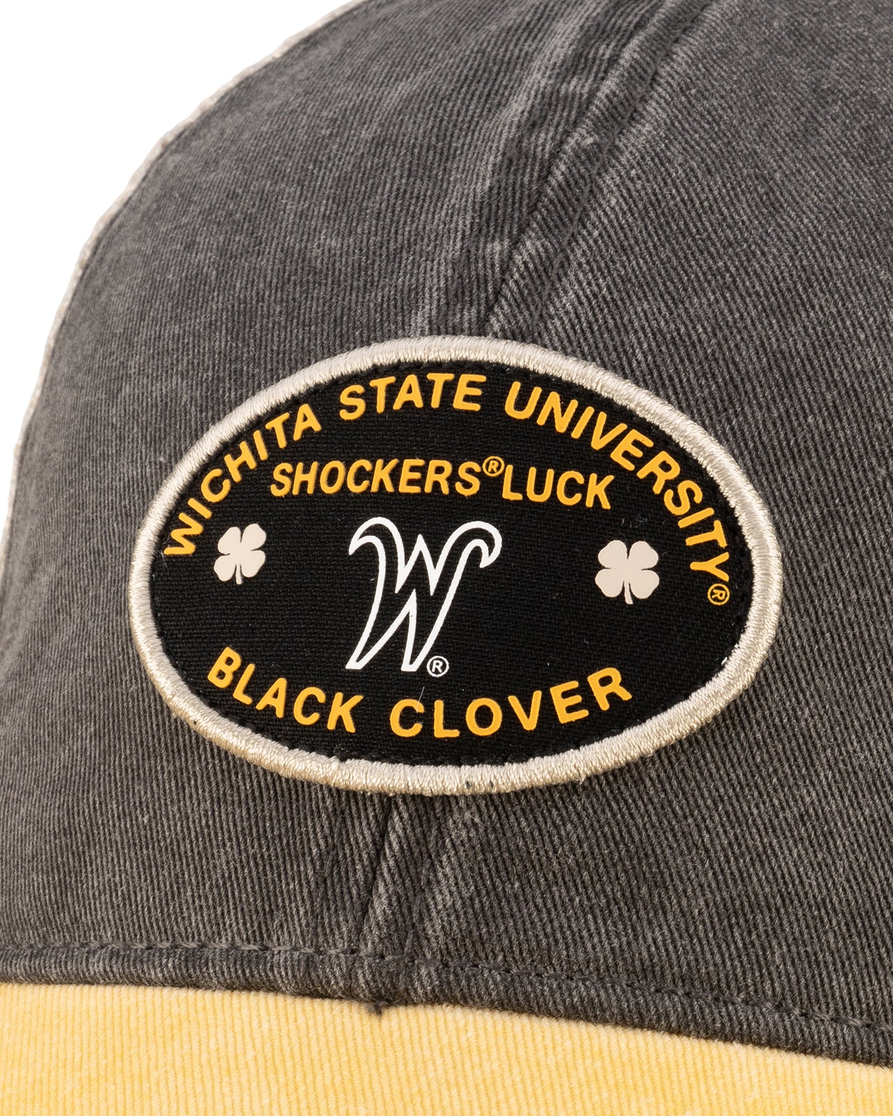 Grey and yellow two tone vintage style hat from Black Clover featuring Wichita State Shockers logo